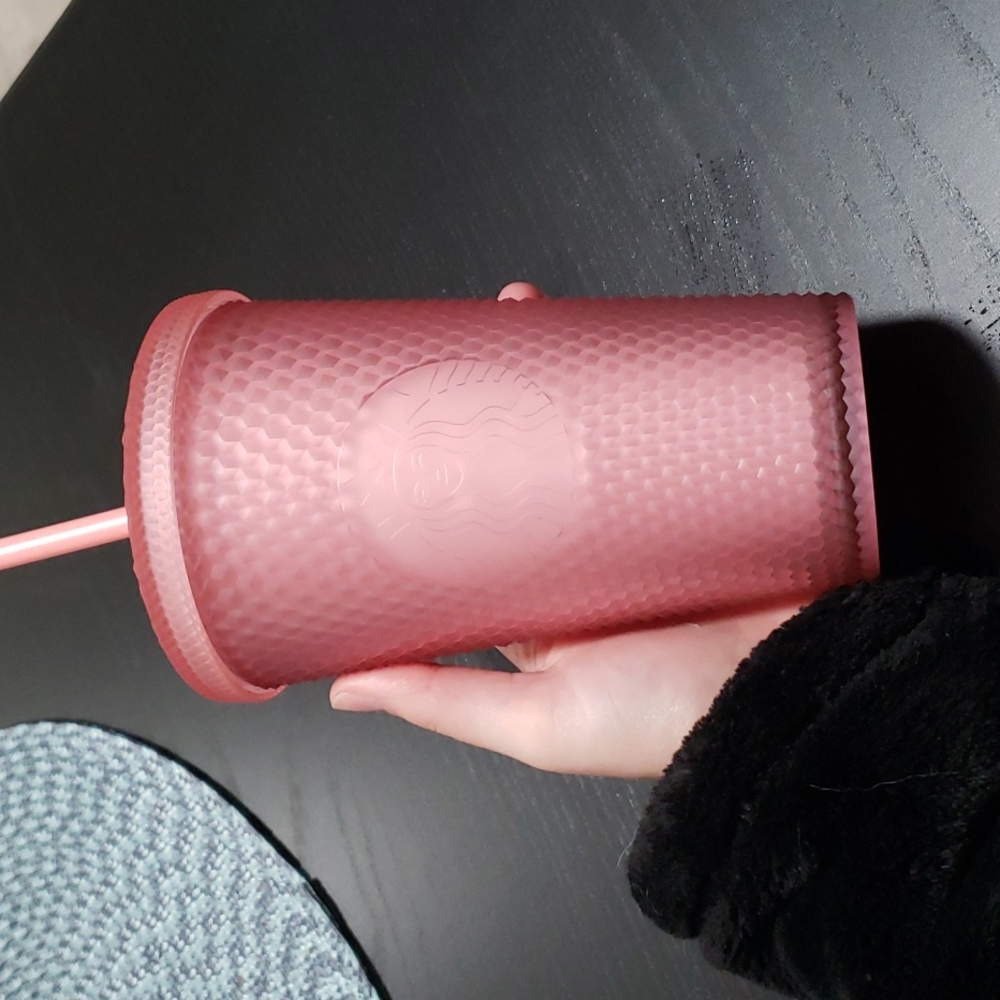 Pink studded Starbucks tumbler
